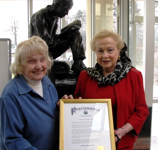 Freeholder Lillian G. Burry and Shirley Norby, president of the Friends of the Library.